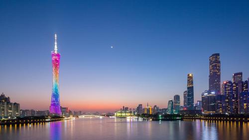 a view of a city skyline with a tall tower at Guangzhou Wogo Yuanbao Hotel-Zhujiang New Town-Free Canton Fair Shuttle Bus & Overseas Buyer Registration Services in Guangzhou