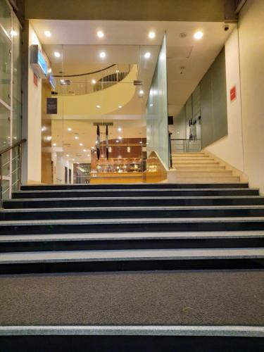 a group of stairs in a building at Four Points by Sheraton Vadodara in Vadodara
