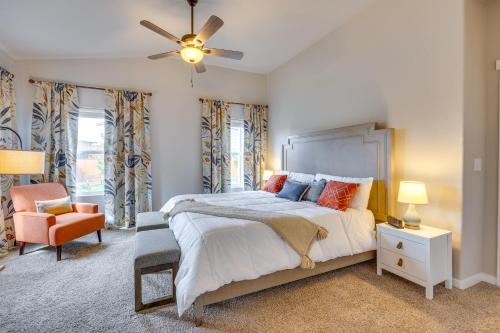 a bedroom with a bed and a ceiling fan at Stunning Peyton Retreat with Game Room, Private Yard in Shirley