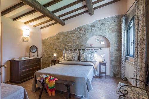 Postel nebo postele na pokoji v ubytování Agriturismo Spazzavento
