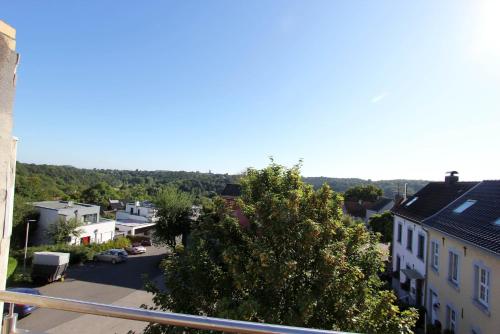 a view from the balcony of a small town at Ferienoase mit Fernblick in Herzogenrath