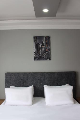 Ένα ή περισσότερα κρεβάτια σε δωμάτιο στο biglife hotel