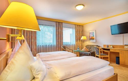 Cama o camas de una habitación en Hotel Das Bayerwald