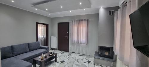 Гостиная зона в Mimarxos Luxury Apartments