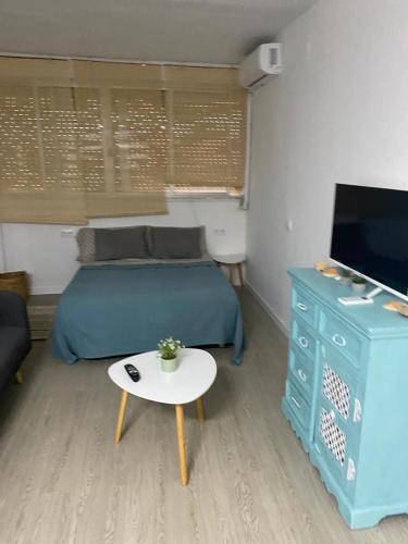 En tv och/eller ett underhållningssystem på Apartamento acogedor El portil