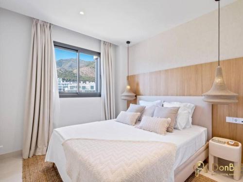 Voodi või voodid majutusasutuse Ático De Lujo Con Jacuzzi En Higuerón West toas