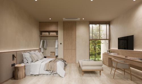 Кровать или кровати в номере Eden Resort & Villas