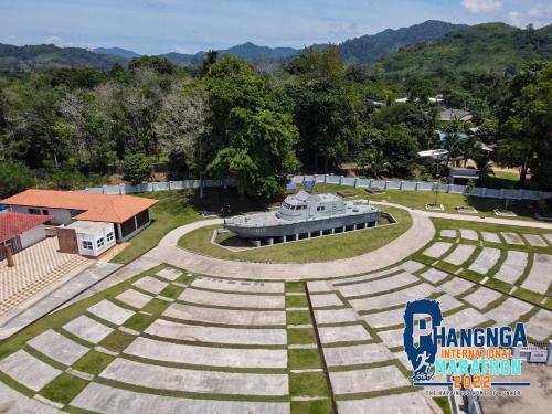 an aerial view of a park with a building at Freedom​ Hostel​ in Khao Lak