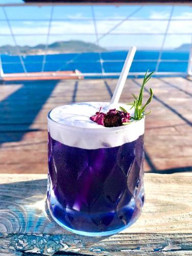 a drink in a glass sitting on a table at Hideaway in Kas