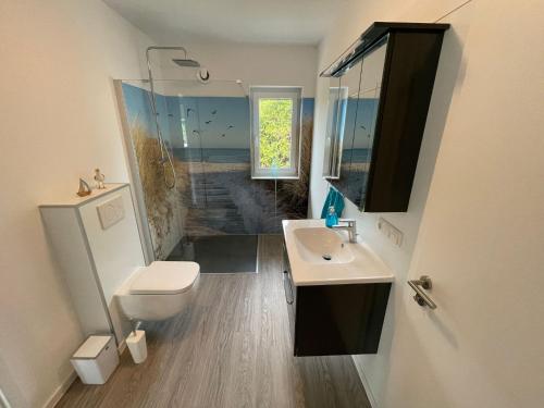 Ванная комната в Ferienhaus Urlaubshafen