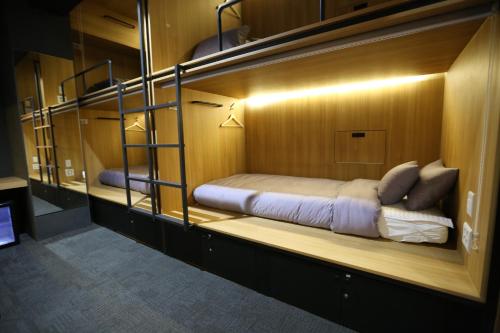 a room with two bunk beds in it at Philstay Ehwa Boutique - Female Only in Seoul