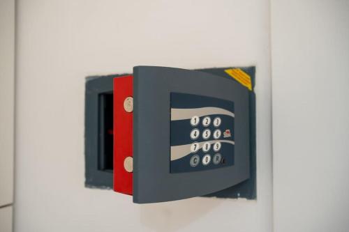 a picture of a telephone hanging on a wall at Luxury Apartment Assisi in Bastia Umbra