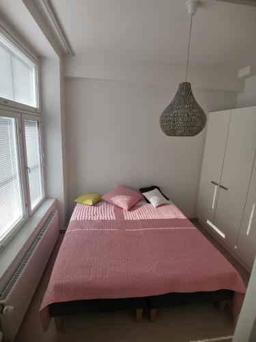 Postel nebo postele na pokoji v ubytování Уютная студия в центре Хельсинки
