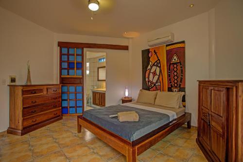 Postel nebo postele na pokoji v ubytování Aissatou Beach Resort