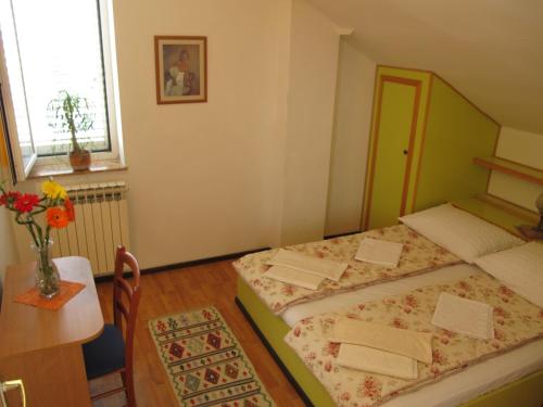 Posteľ alebo postele v izbe v ubytovaní Guest House Maria Bilicic