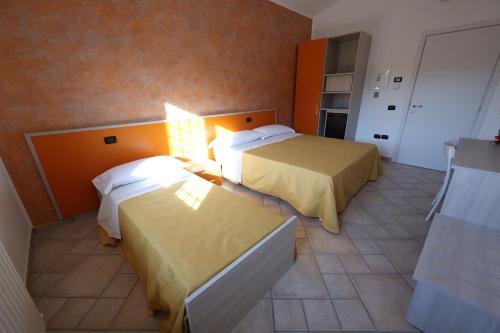 Ένα ή περισσότερα κρεβάτια σε δωμάτιο στο Bed and Breakfast a casa di Valerio