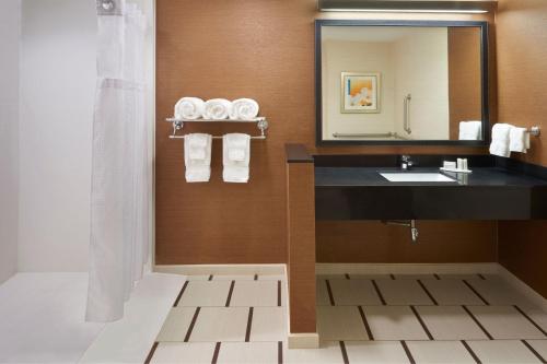 a bathroom with a sink and a mirror at Fairfield Inn & Suites by Marriott Barrie in Barrie