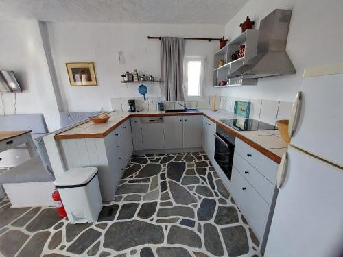 Kuchyň nebo kuchyňský kout v ubytování Styfilia Beachfront Apartments