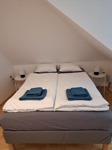 Flataid Apartments Gössendorf/Magnaにあるベッド