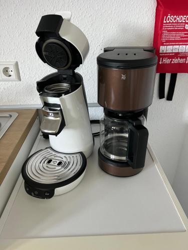 Dapur atau dapur kecil di Ferien-Whg Stünkel nahe Steinhuder Meer mit Garten und Balkon