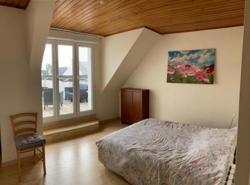 Ένα ή περισσότερα κρεβάτια σε δωμάτιο στο Appartement complet 65 m2 avec terrasse sud 18 m2