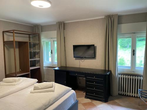 Ένα ή περισσότερα κρεβάτια σε δωμάτιο στο San Antonio Chalet