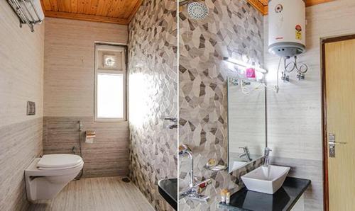 Kanari Mussoorie by Red Finch Hotels في موسوري: حمام مع مرحاض ومغسلة