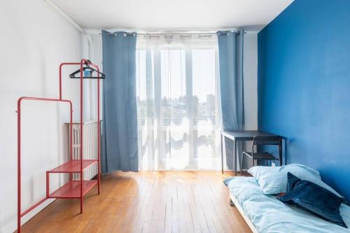 Postel nebo postele na pokoji v ubytování Cénoslocs - Paris à vos pieds pour 6 pers.
