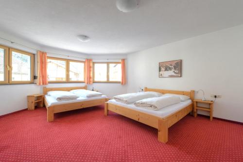 Postel nebo postele na pokoji v ubytování Appartement Strolz