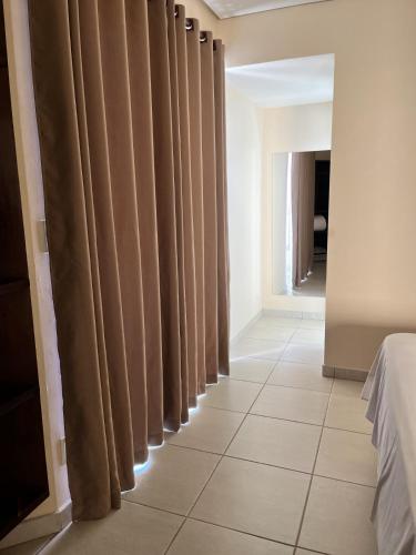 Katil atau katil-katil dalam bilik di Tropical Palace Hotel
