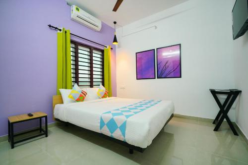 Letto o letti in una camera di Kaippillil apart hotel