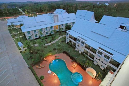 an aerial view of a large building with a swimming pool at Nantrungjai Boutique Hotel in Nan