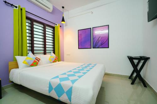 Letto o letti in una camera di Kaippillil apart hotel