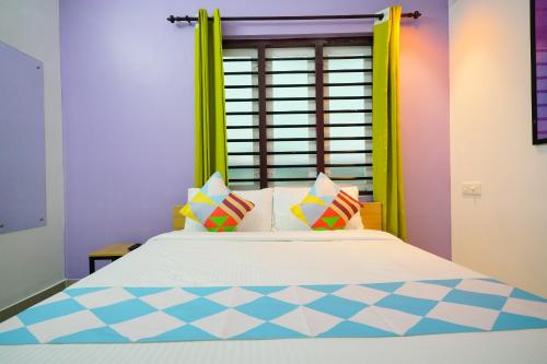 Letto o letti in una camera di Kaippillil apart hotel