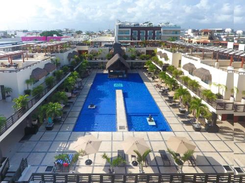an overhead view of a swimming pool on a building at AT 1102 PrivatePool- Exclusive Aldea Thai in Playa del Carmen