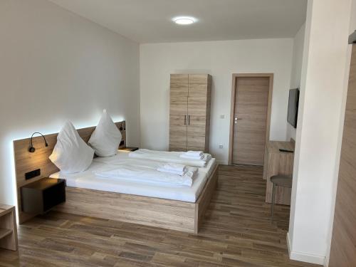 Postel nebo postele na pokoji v ubytování NB Apartments