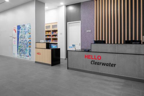 a lobby with a halo cleaners counter in a store at TownePlace Suites by Marriott Tampa Clearwater in Clearwater