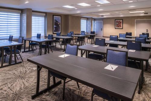 a classroom with tables and chairs in a room at Hampton Inn Fort Lauderdale Plantation in Plantation