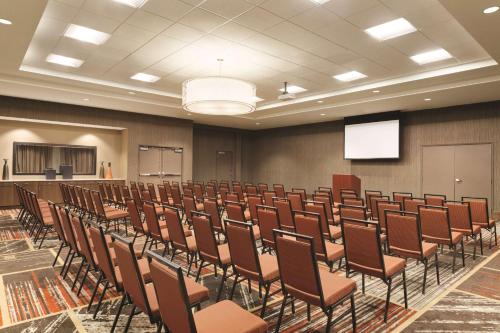 a lecture room with a row of chairs and a screen at Hilton Garden Inn Phoenix-Tempe University Research Park, Az in Tempe