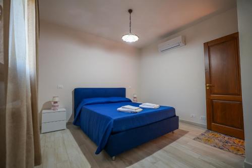 Ένα ή περισσότερα κρεβάτια σε δωμάτιο στο Agriturismo Case Rapputi