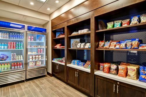 a walk in pantry filled with lots of food at Hampton Inn & Suites Detroit/Troy in Clawson