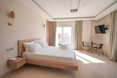 Postel nebo postele na pokoji v ubytování Soul House Kuşadası