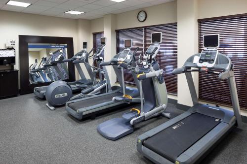 a row of cardio machines in a gym at Hampton Inn & Suites Oklahoma City-Bricktown in Oklahoma City
