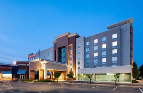 a rendering of a hotel with a parking lot at Hampton Inn & Suites St. Louis at Forest Park in Saint Louis