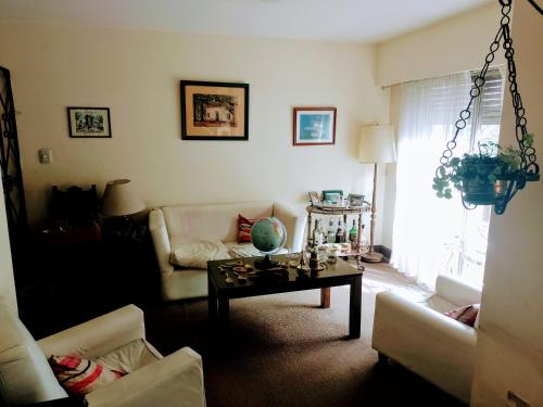 Posezení v ubytování Cama en habitacion compartida