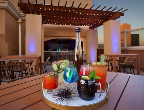 a tray of drinks on a table on a patio at DoubleTree by Hilton El Paso Downtown in El Paso