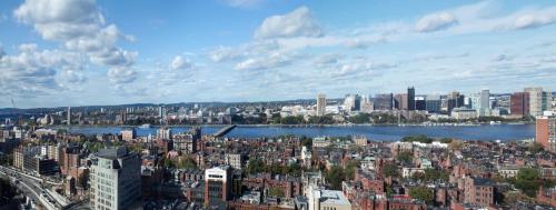 a view of a city with a river and buildings at Hilton Boston Back Bay in Boston