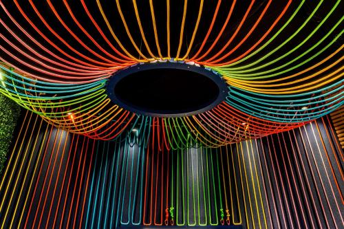 a colorful curtain hanging from a ceiling at the Curtis Denver - A DoubleTree by Hilton Hotel in Denver