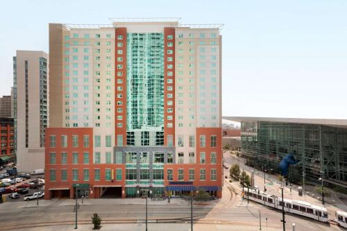 a view of a city with tall buildings at Embassy Suites by Hilton Denver Downtown Convention Center in Denver