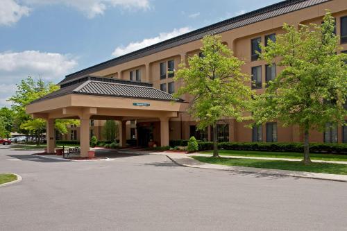 a building with a gazebo in front of it at Larkspur Landing Ann Arbor in Ann Arbor